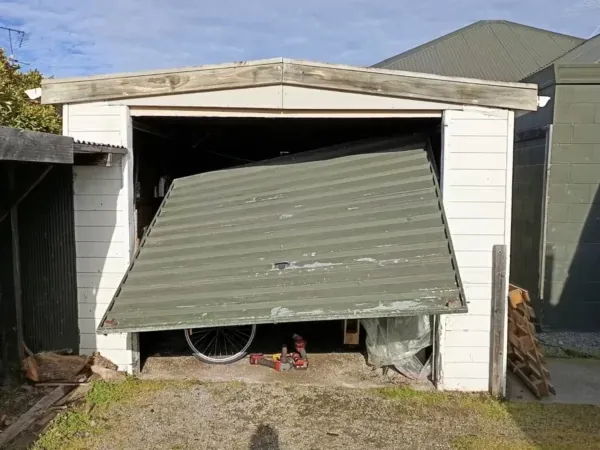 Broken single tilt door